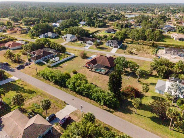 Birds eye view of property with a residential view
