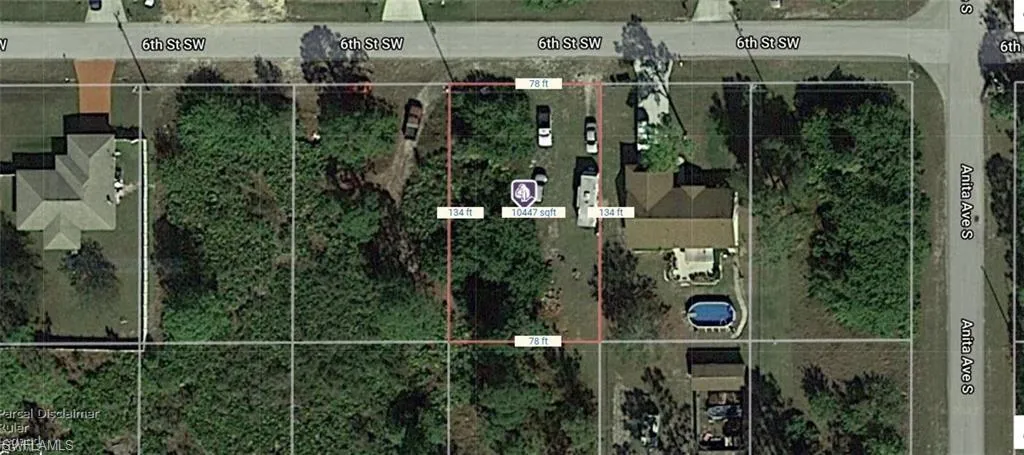 Aerial map of property and surrounding area featuring property parcel outlined
