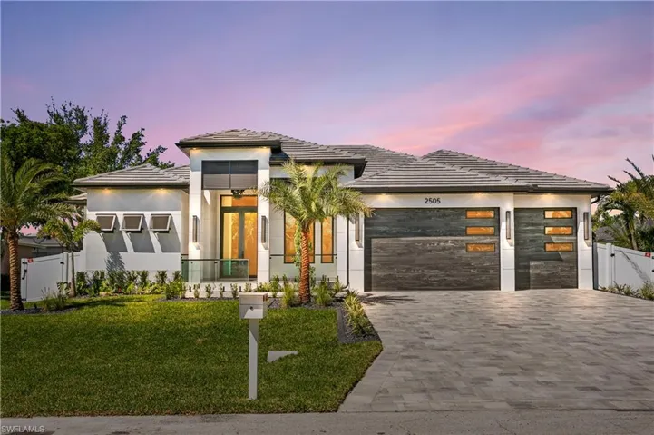EXTRAORDINARY OPPORTUNITY waits FOR YOU to OWN CONTEMPORARY LUXURY OASIS in the HEART of the SOUGHT-AFTER SW CAPE CORAL PARADISE!