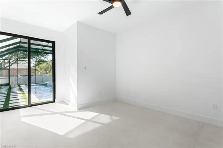 Second Master Bedroom with private sliding doors to the outdoor oasis!