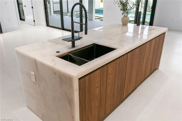 WATERFALL KITCHEN ISLAND with large sink w/ WATERFALL FAUCET add on.