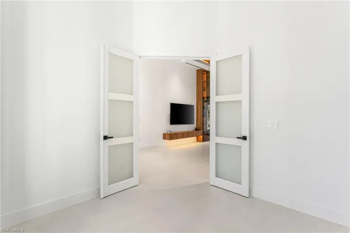 The spacious, beautifully designed DEN/STUDY/OFFICE seamlessly blends comfort and sophistication, making it an ideal spot to unwind or entertain.