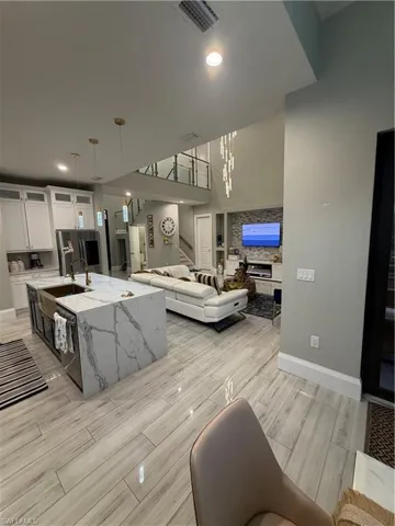 Dining room featuring wood finish floors and recessed lighting