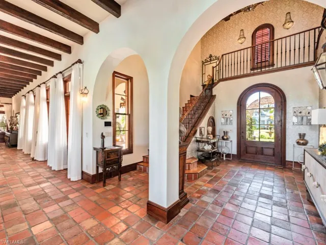 Foyer featuring beamed ceiling