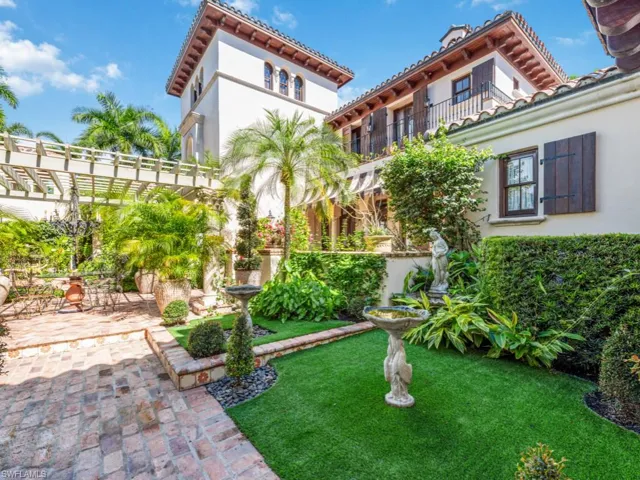 View of yard with a pergola and a patio area