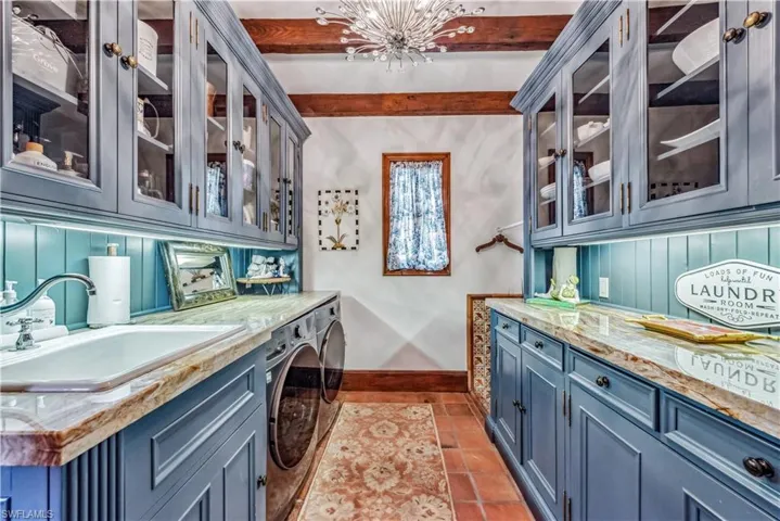 Laundry room with dog bathing station