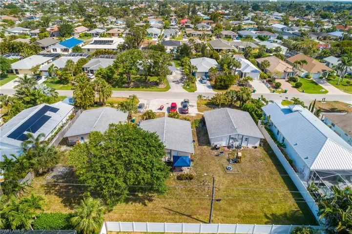 Birds eye view of property with a residential view