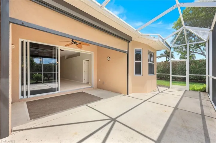 View of patio / terrace with glass enclosure and ceiling fan