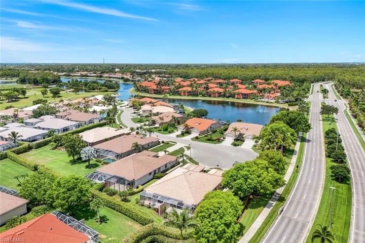 Aerial view of residential area with a large body of water