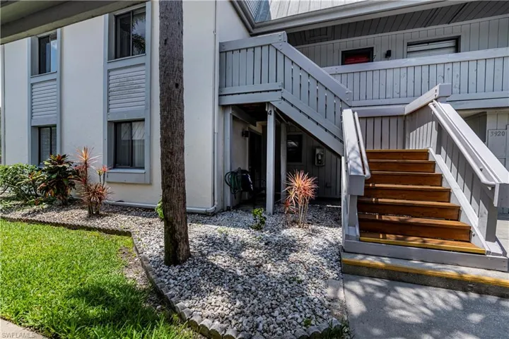 Well Landscaped Entrance to your end unit home providing additional light!
