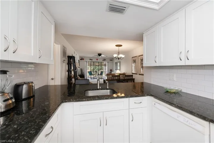 A u-shaped kitchen is so efficient and welcoming