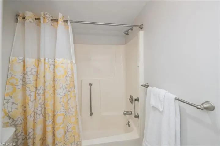 Enjoy your tub/shower combo with grab bars for your safety