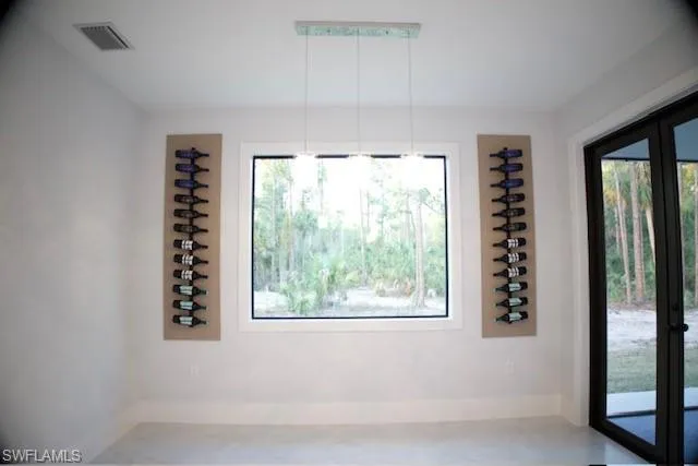 Unfurnished dining area with healthy amount of natural light