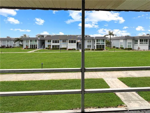 View of home's community featuring a lawn