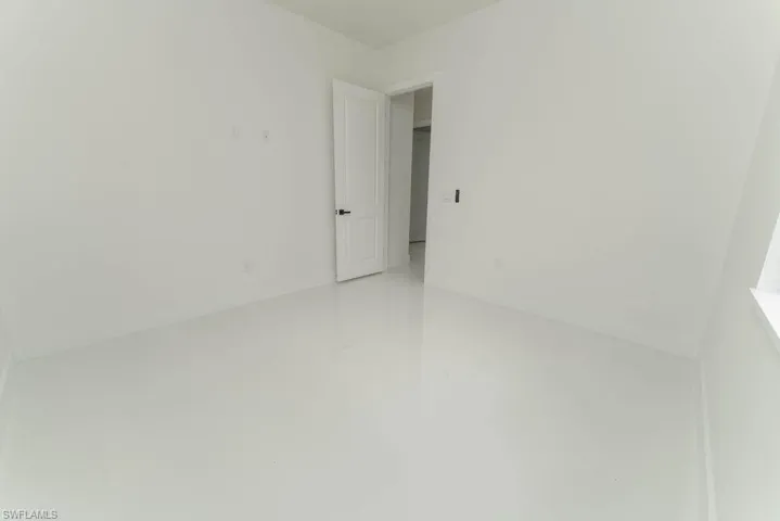 Empty room with finished concrete flooring