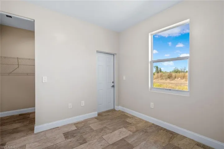 Spare room with baseboards