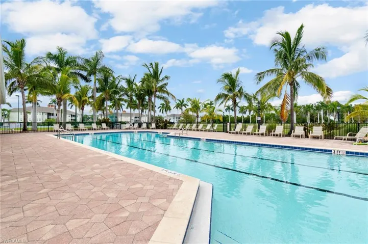 Community pool with a patio area