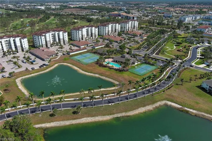 Aerial view of property's location with a nearby body of water