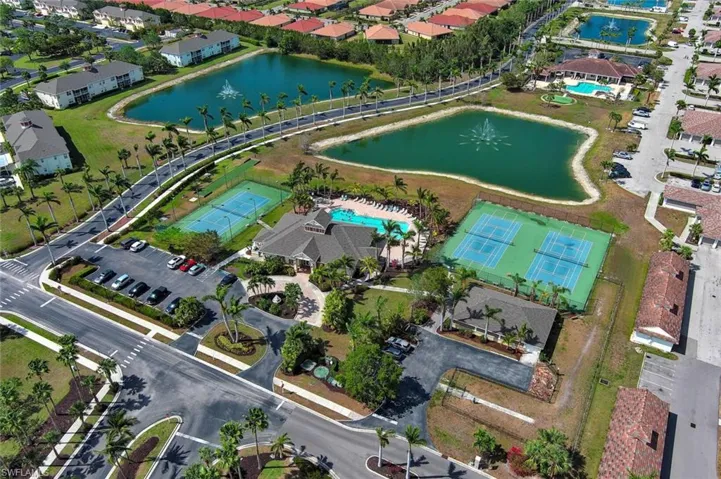 Aerial overview of property's location with a large body of water and nearby suburban area