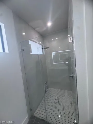 Bathroom featuring a stall shower