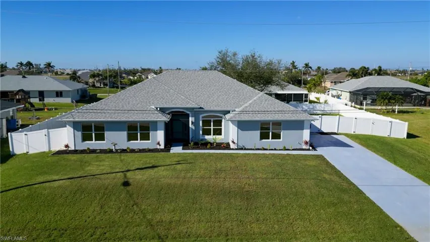 View of front of house with a front yard