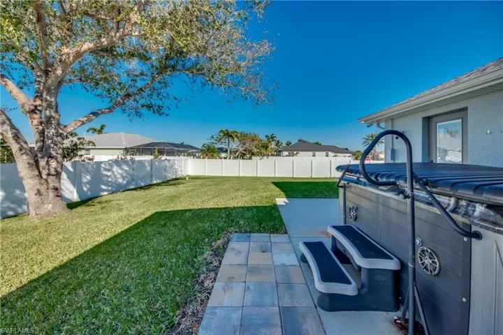 View of backyard featuring a patio