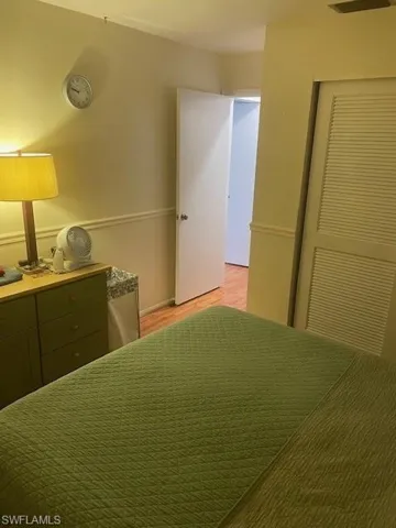 Unfurnished bedroom featuring light wood-type flooring