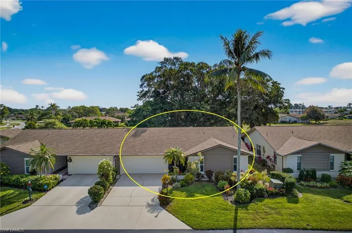 Single story home featuring driveway and a front lawn