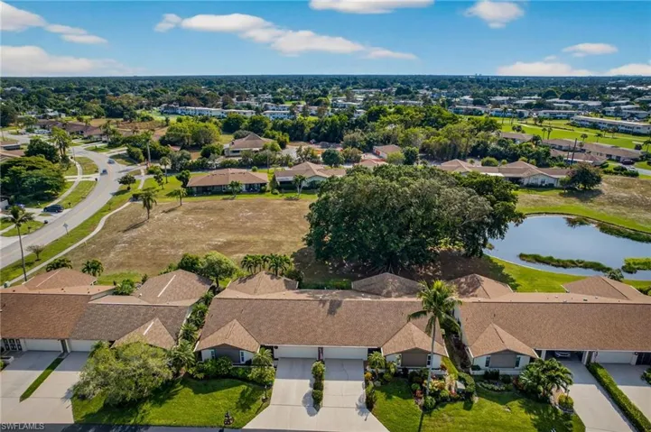 Aerial overview of property's location with nearby suburban area