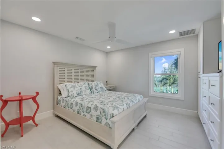 Bedroom with recessed lighting and a ceiling fan