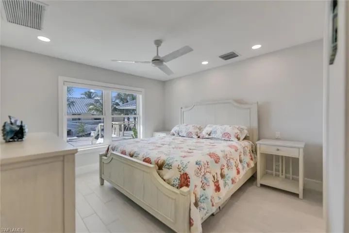 Bedroom featuring recessed lighting and a ceiling fan