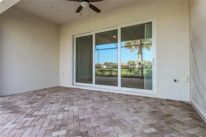 View of patio with a new ceiling fan