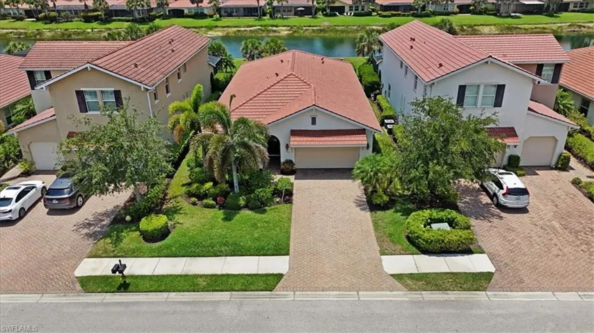 Aerial view of residential area with a large body of water