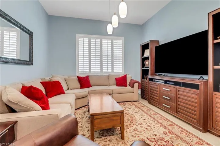 Living/Den area featuring healthy amount of natural light
