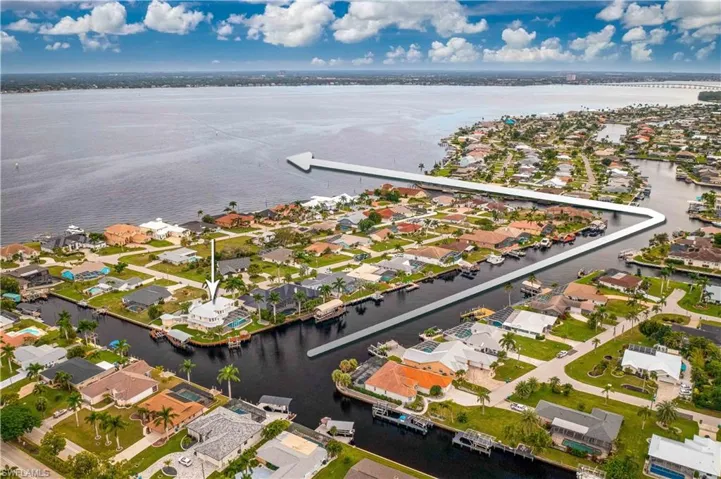 Aerial view with a residential view and a water view