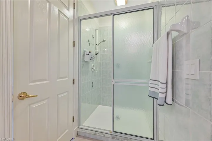 Bathroom featuring a shower stall