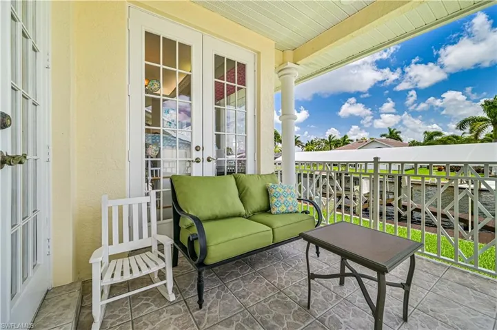 Side patio with french doors off the Den