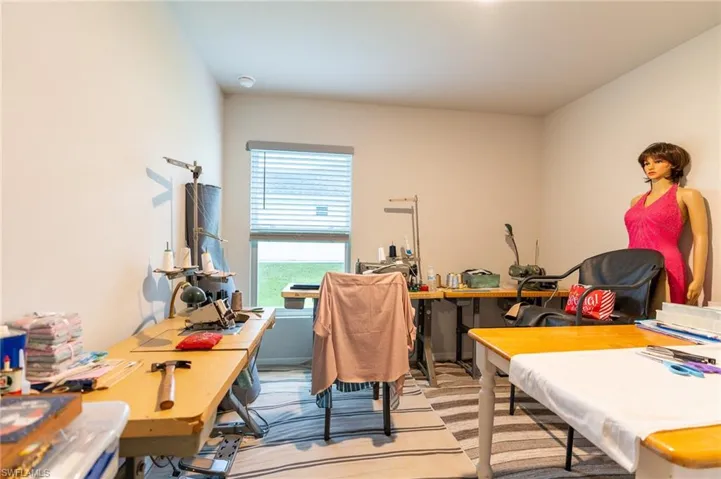 View of carpeted home office