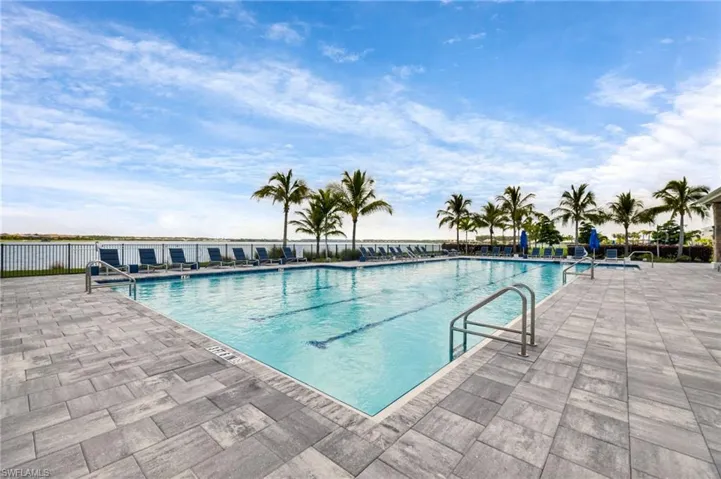 View of swimming pool with a patio area