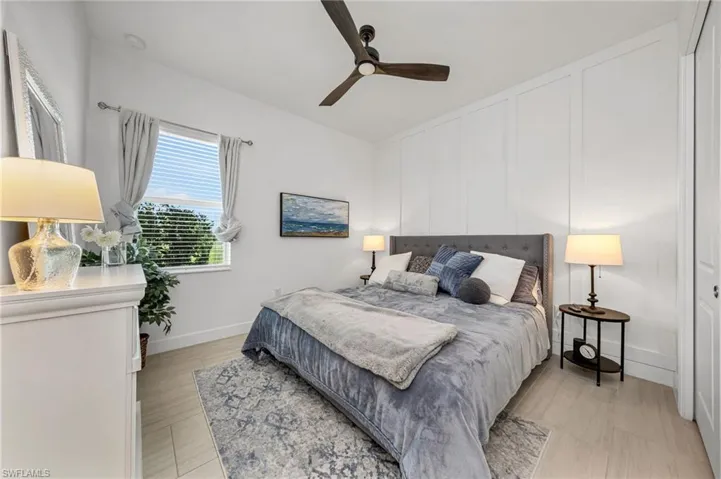 Bedroom with white linear accent wall