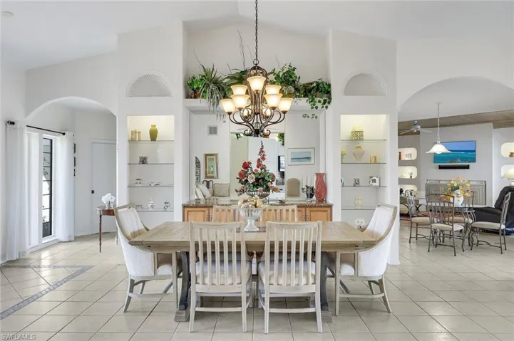Dining has An Optional Open Close Pass Thru Sliding Door to Built In Buffet