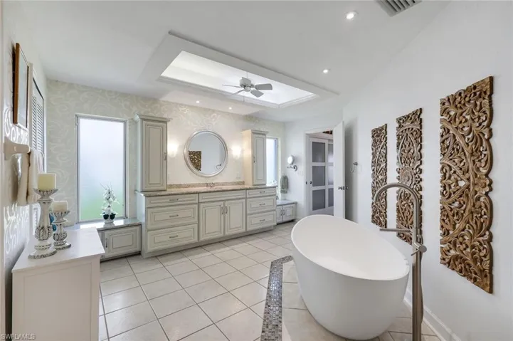 Remodeled Zen, SPA Bath, with Multiple Custom Storage,2 Towers, Raised Cabinetry, 2 Separate Bath Areas, 2 Separate Walk In Closets. Unique Stone Soaking Tub