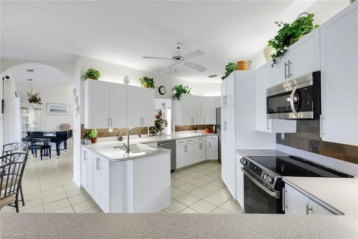 Expanded Raised Archways Welcome One Area to the Next Living Space