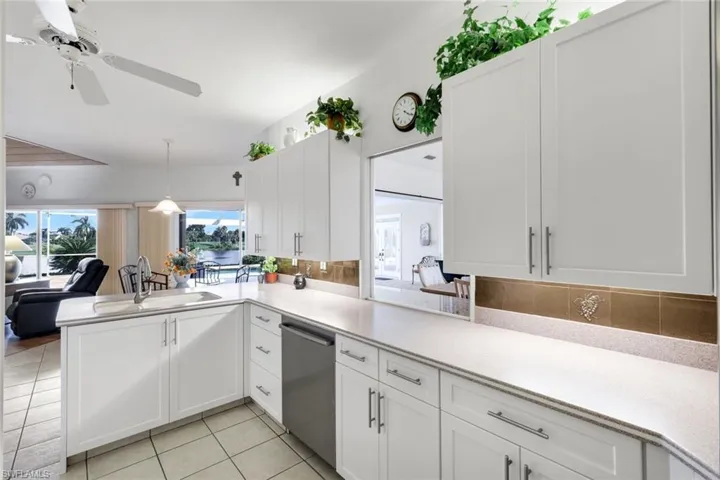 Counter Pass Thru Window to the Dining Buffet Shown Open