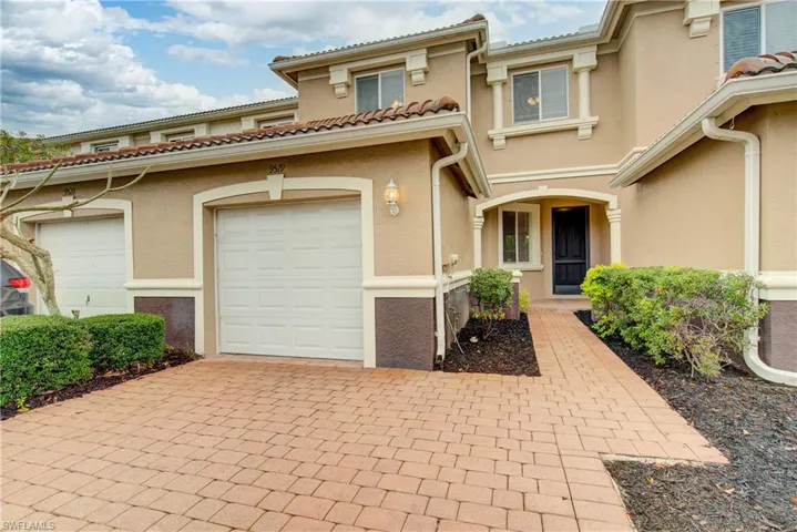 View of front of home with a garage
