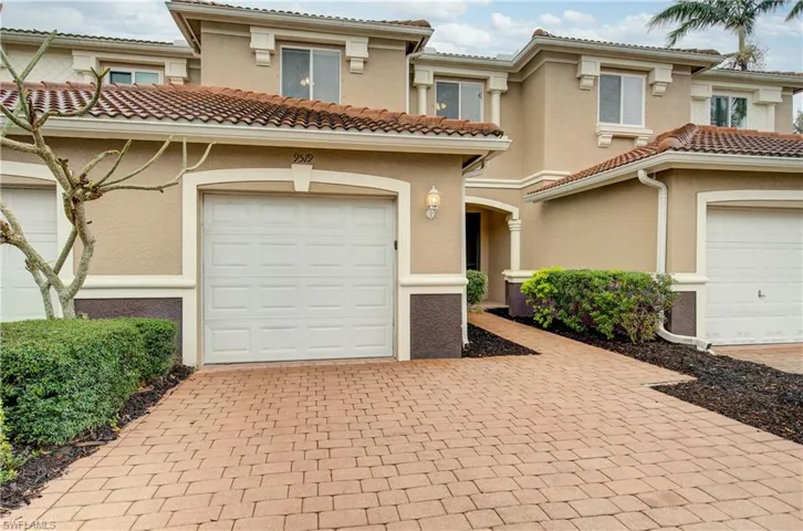 View of front of home featuring a garage