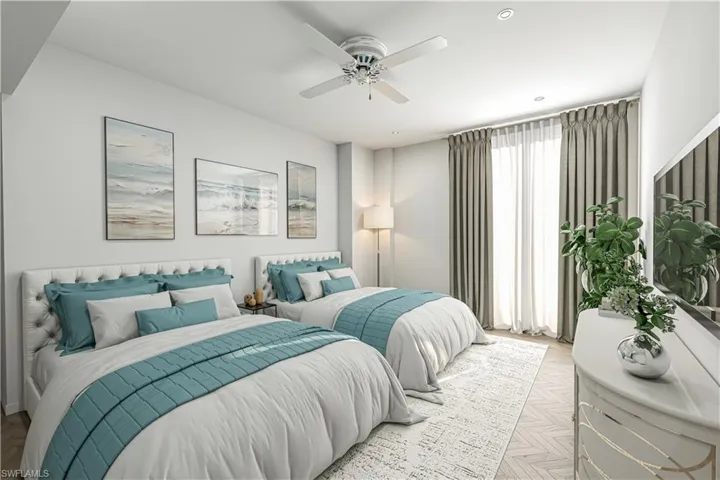 Bedroom with ceiling fan and recessed lighting