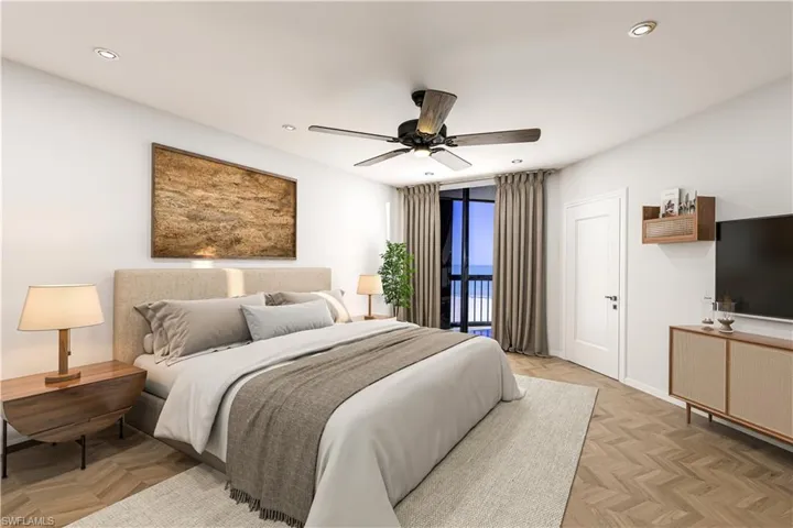 Bedroom featuring parquet flooring, a ceiling fan, and floor to ceiling windows