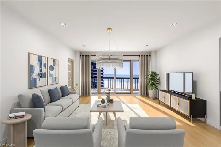 Living area with suspended lighting and light wood finished floors