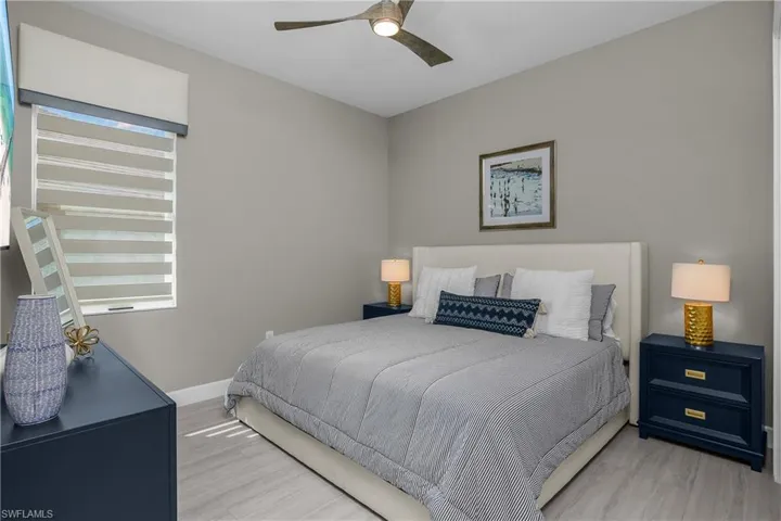 Bedroom featuring ceiling fan and light wood-style floors